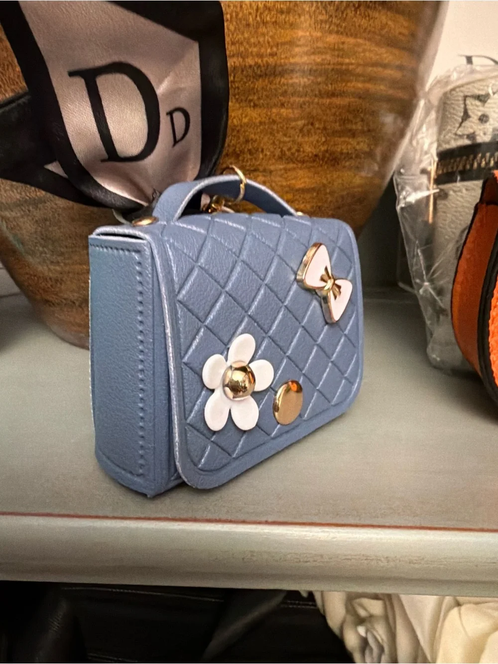 Dainty Quilted Blue Mini Top-Handle Bag with Flower & Bow Accents